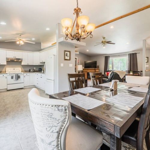 Enough seating for 6 guests. Access to the back patio and BBQ is just off the dining area. This is the perfect place to make memories.