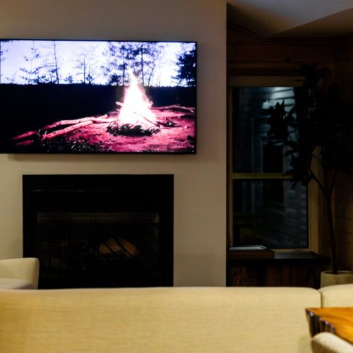 Added a new 65" QLED smart TV  with 1600 live channels + YouTube, Amazon Prime and Netflix Premium services.