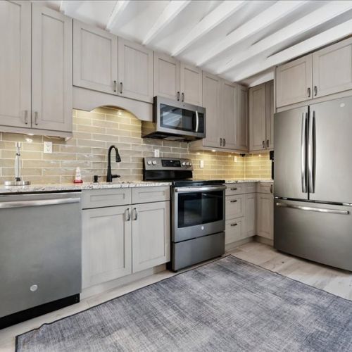 Fully equipped kitchen with modern appliances, great counter space, and everything you need for cooking at home. Perfect for extended stays and easy meals in.