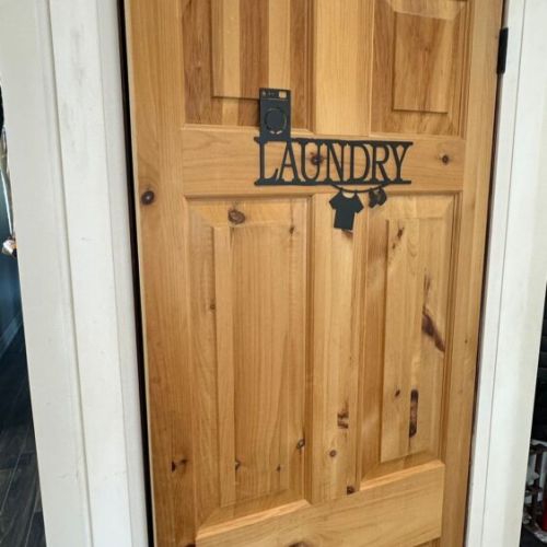 Convenient in-cottage laundry room with full washer and dryer access for your stay.