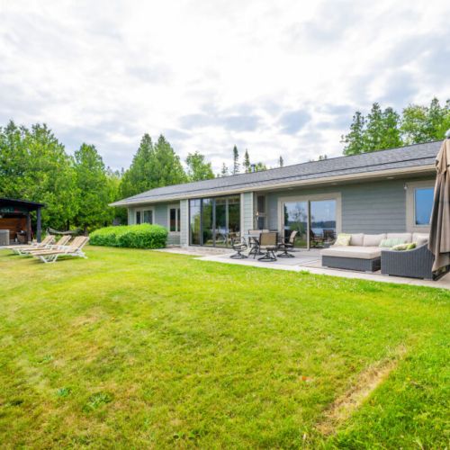 Spacious yard and outdoor umbrella great for those sunny days.