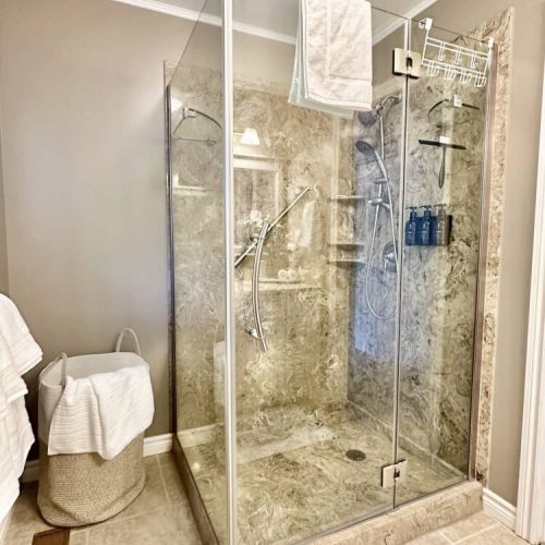 Thoughtfully designed with a step-in shower and grab bars for added comfort and accessibility.