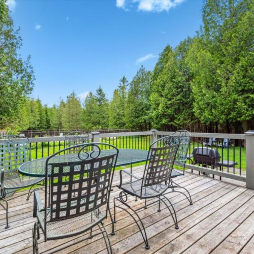 Dine al fresco on the spacious back deck,  with peaceful forest views. A great place to start the day or enjoy an evening meal surrounded by nature.