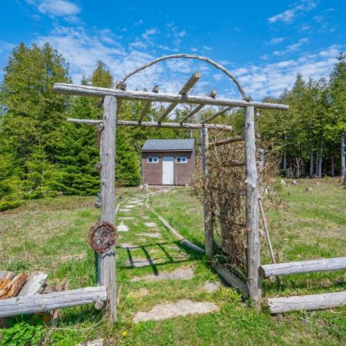 Follow the path under the arch and take a hike out into nature.