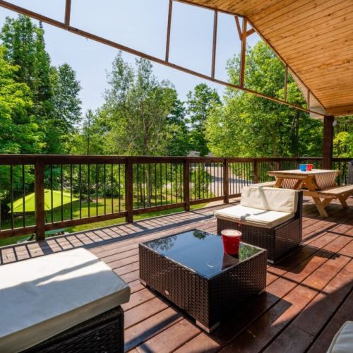 The gorgeous upper veranda provides a view of the west lawn, with ample entertaining space and massive direct connect BBQ. A white cedar picnic table is ready for you to serve up a feast!