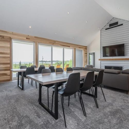 Designed by a locally renowned architect and builder, the great room was designed to serve large groups or families with an absolutely stunning view of Lake Huron.