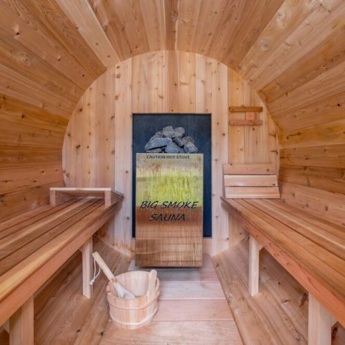 Rest, relax and renew in. the wood-fired cedar barrel sauna. The front windows peer out to a gorgeous view.