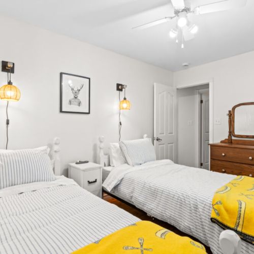 Comfortable bedroom with two double beds—perfect for families or friends.