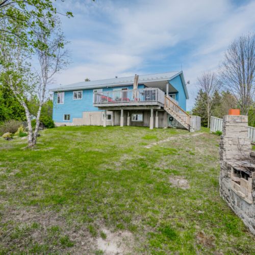 Relax around the stone firepit or enjoy a picnic on the grass—ideal for families or friends reconnecting in a peaceful setting.