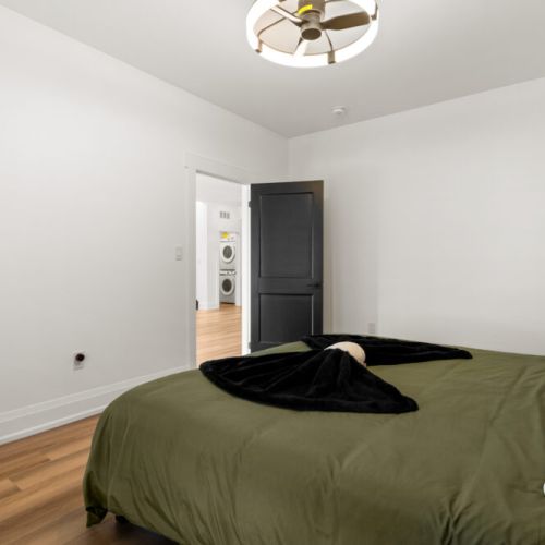 Unwind in a spacious bedroom designed for a peaceful night's sleep.