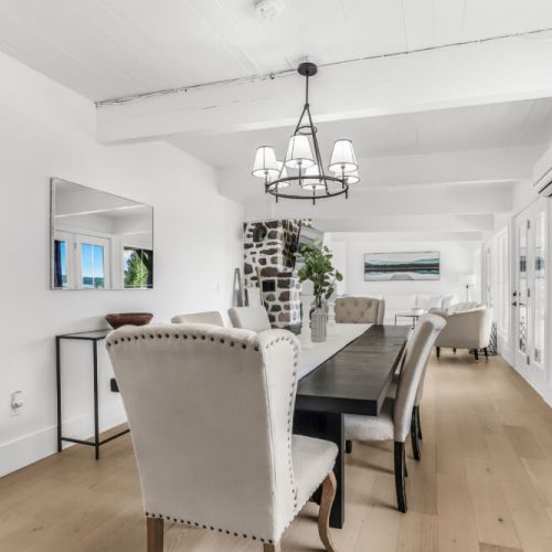 Spacious dining area perfect for family meals card games and gathering together.